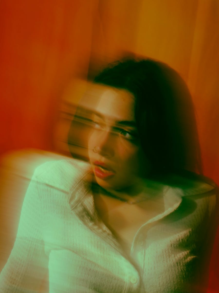 Creative portrait of a woman with motion blur and dynamic lighting